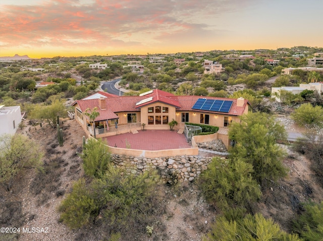 view of aerial view at dusk