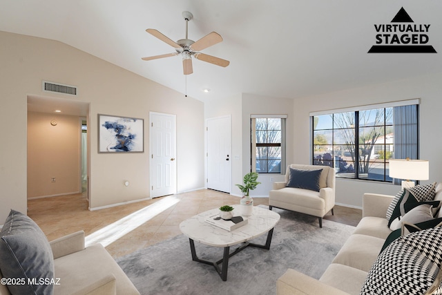 tiled living room with lofted ceiling and ceiling fan