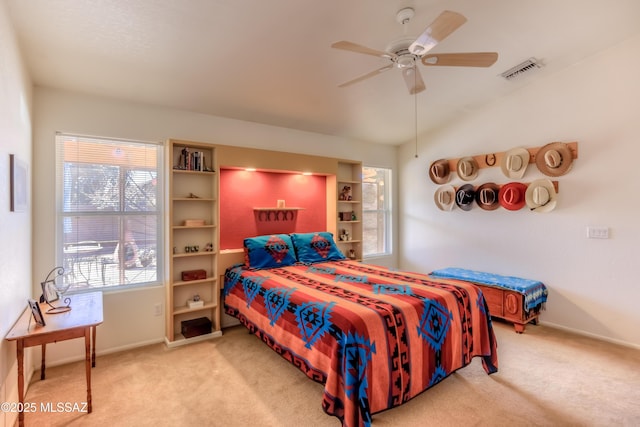 bedroom with lofted ceiling, carpet flooring, and ceiling fan