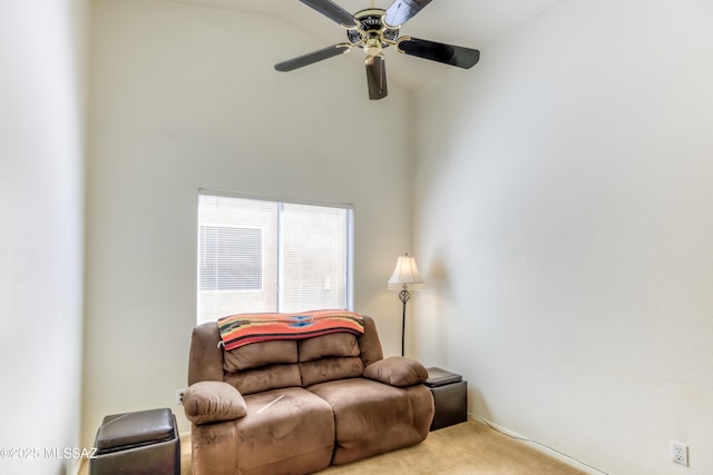 living room featuring light colored carpet and ceiling fan