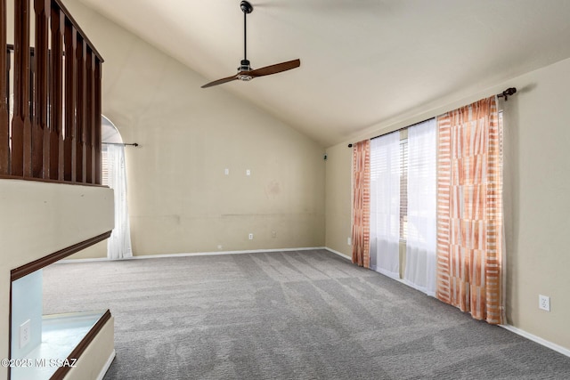 unfurnished living room with carpet floors, high vaulted ceiling, and ceiling fan