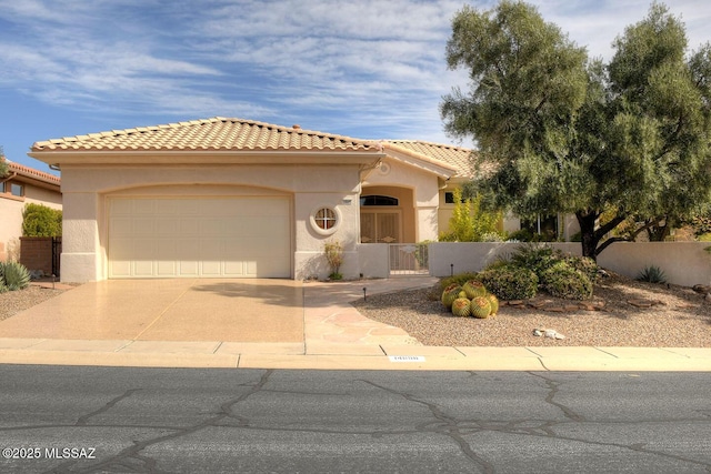 view of front of property with a garage