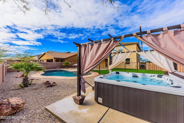 view of pool with a hot tub and a patio