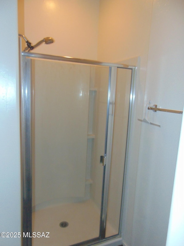 bathroom with a stall shower