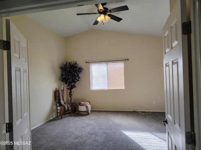 unfurnished room featuring lofted ceiling, carpet floors, and a ceiling fan