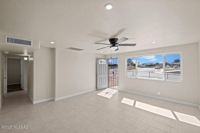 unfurnished room featuring ceiling fan