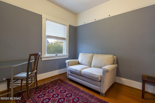 home office with hardwood / wood-style floors