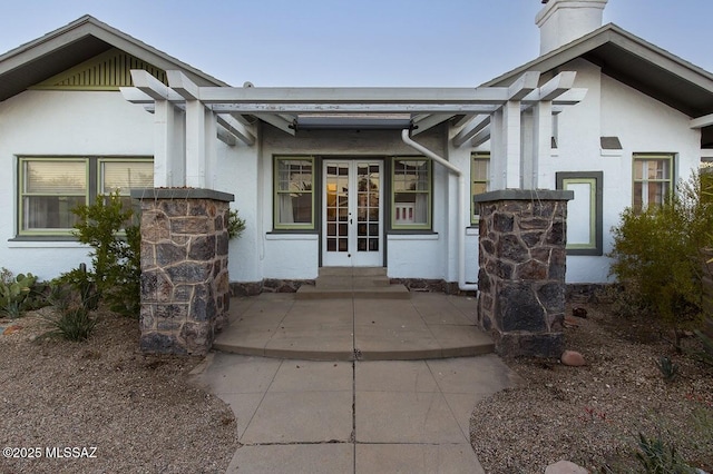 view of exterior entry with french doors