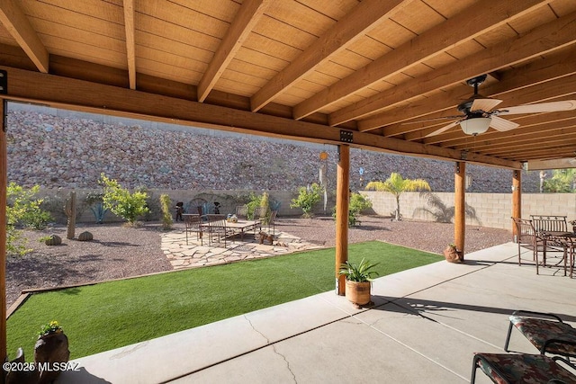 view of patio / terrace featuring ceiling fan