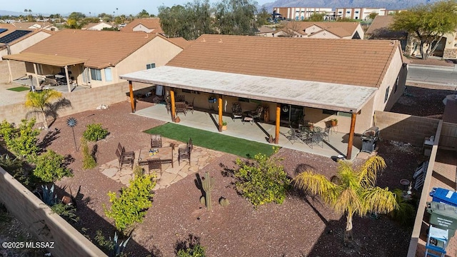 rear view of property with a patio