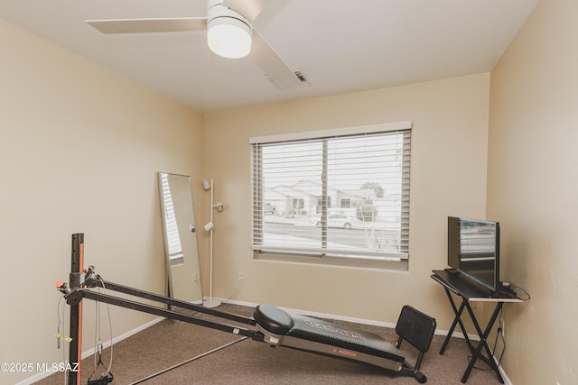 exercise room featuring ceiling fan