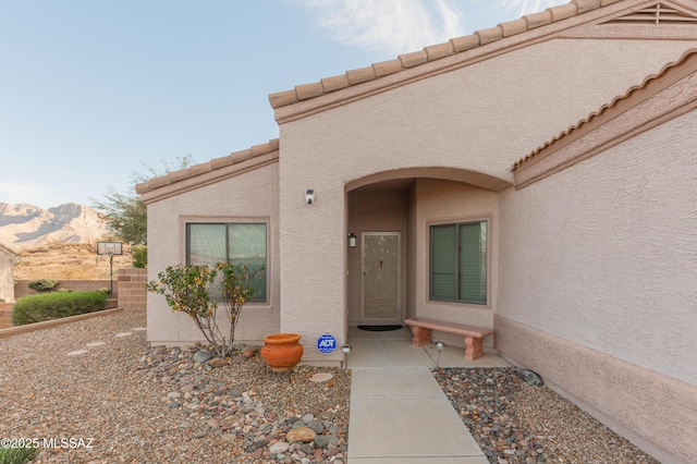 entrance to property with a mountain view