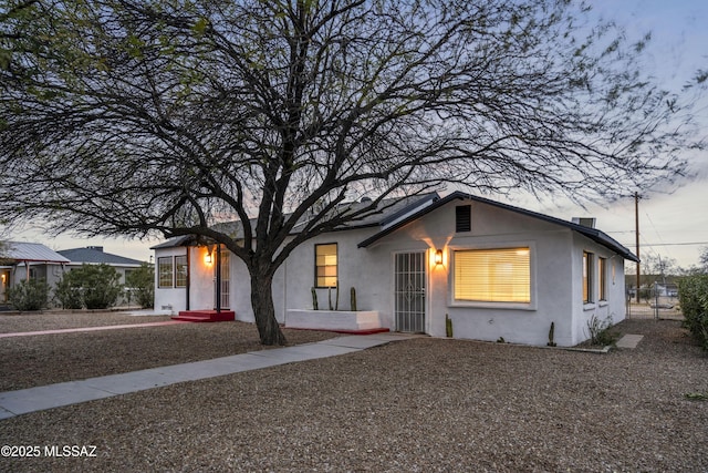 view of front of property featuring stucco siding