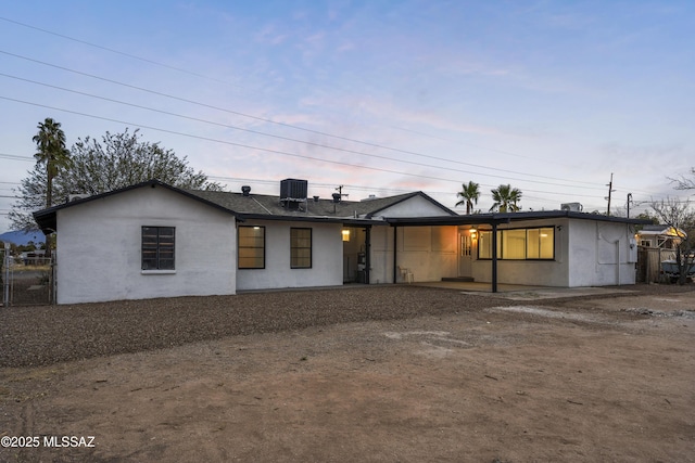 view of front of home featuring central air condition unit