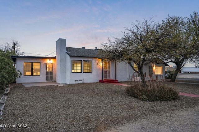 view of front of home featuring a patio