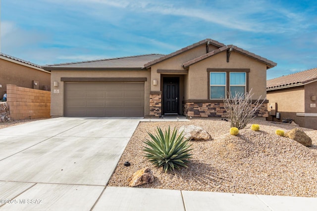 view of front of property featuring a garage