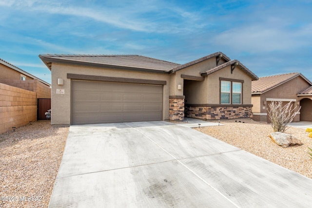 single story home with a garage