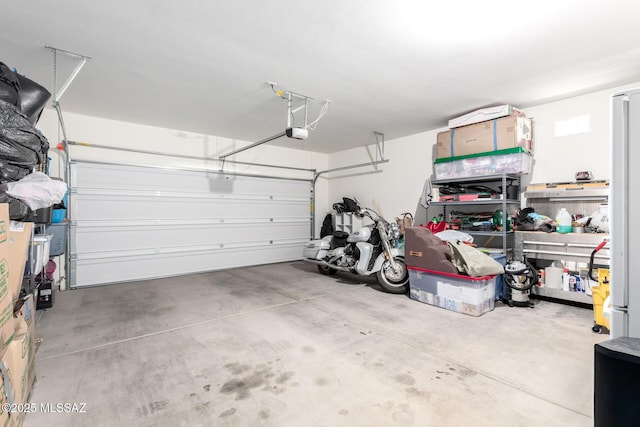 garage featuring a garage door opener