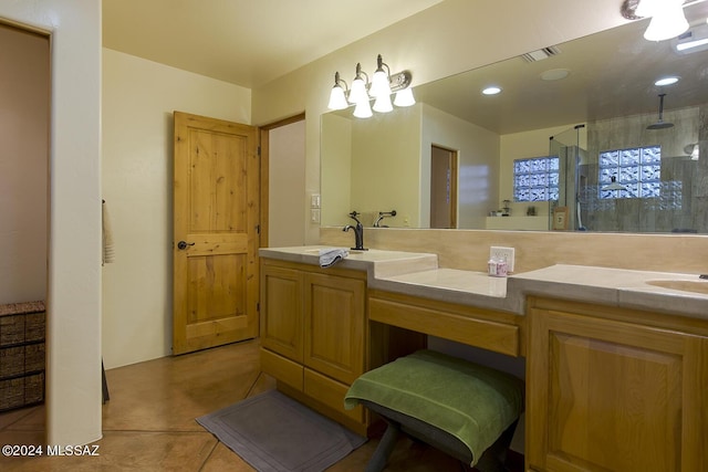 bathroom featuring vanity and an enclosed shower