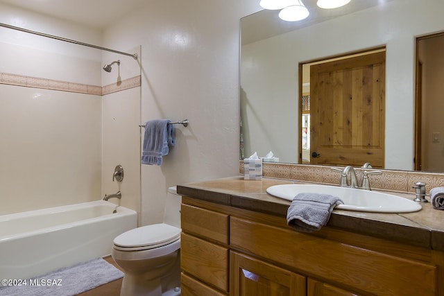 full bathroom with vanity, toilet, and shower / tub combination