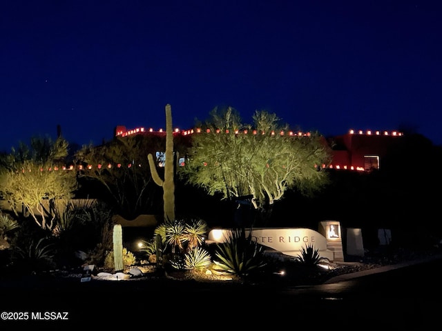 view of yard at twilight