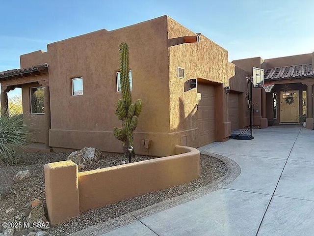 view of property exterior with a garage