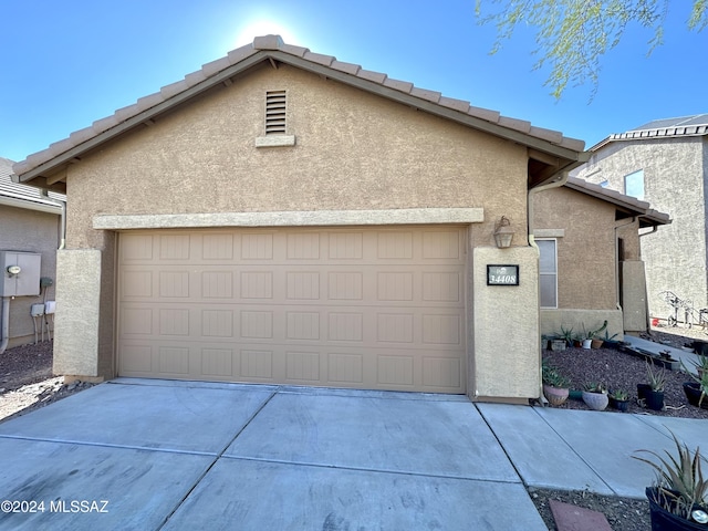 exterior space with a garage