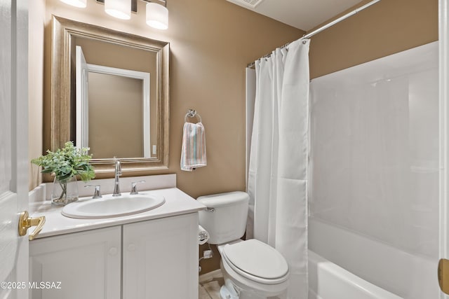 full bathroom with vanity, toilet, and shower / tub combo with curtain