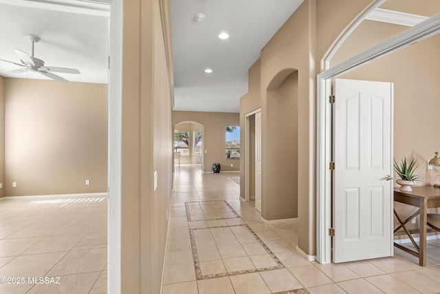 corridor with light tile patterned floors