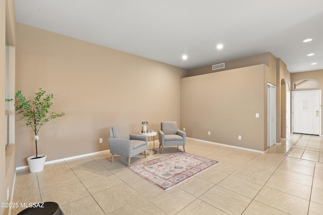 sitting room with light tile patterned flooring