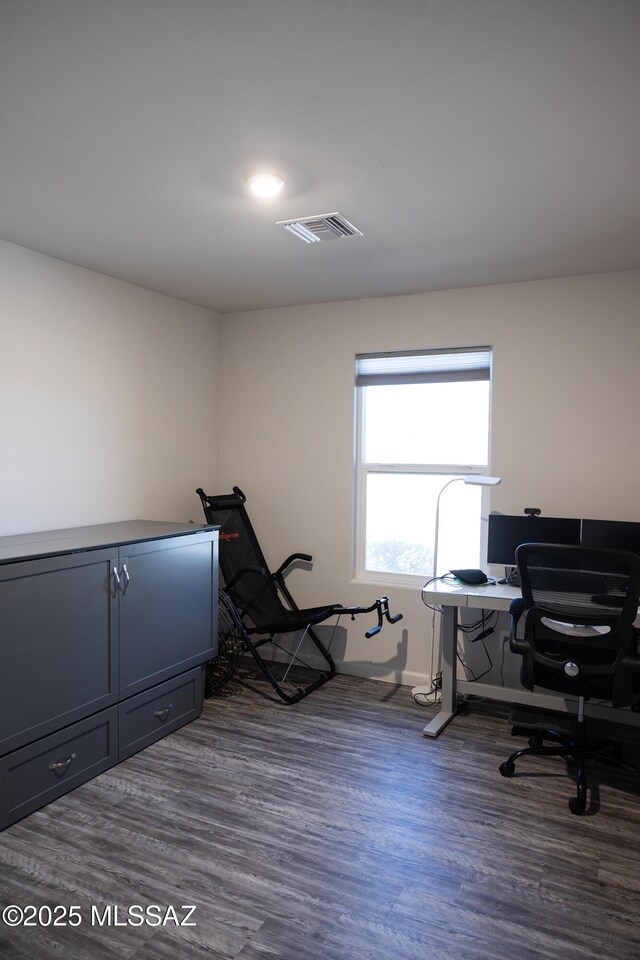 office featuring dark wood finished floors and visible vents