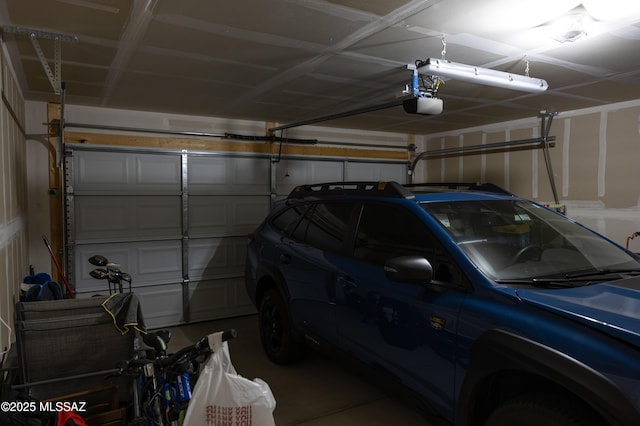garage featuring a garage door opener