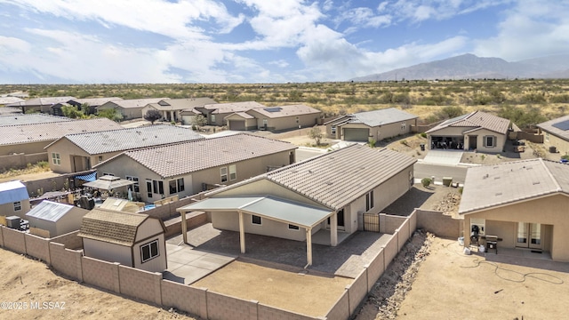 1599 W Cottonwood Bluffs Dr, Benson, AZ 85602 - aerial view of residential area with a mountain backdrop