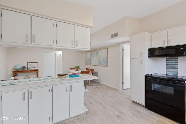 kitchen with black appliances, light hardwood / wood-style flooring, and white cabinets