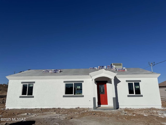 view of front of house featuring stucco siding