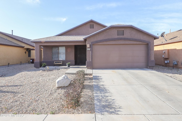 ranch-style home with a garage