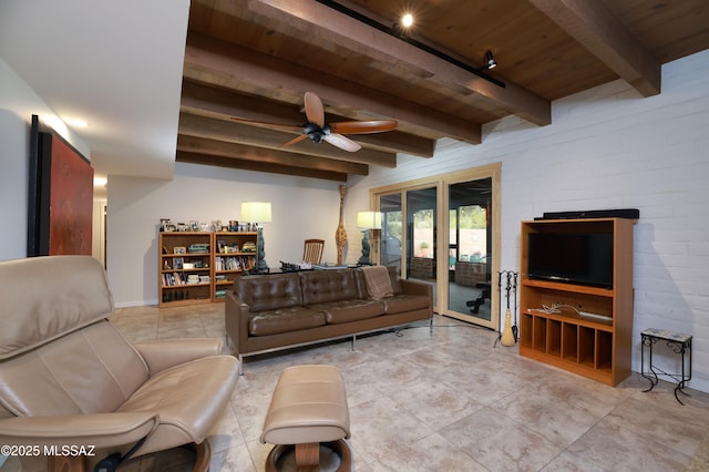 living room featuring beam ceiling, wood ceiling, and ceiling fan