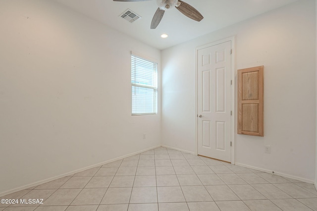 unfurnished room with ceiling fan