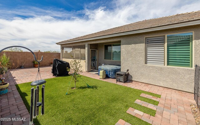 view of yard with a patio area and fence