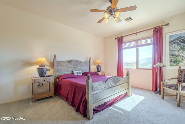 bedroom featuring carpet, visible vents, and ceiling fan