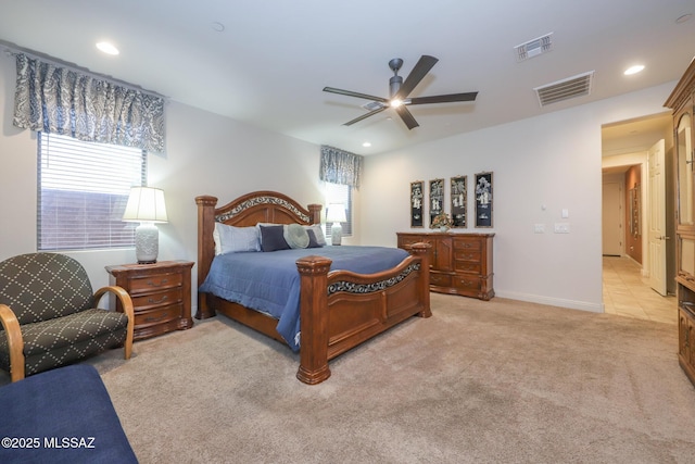 bedroom with a ceiling fan, recessed lighting, visible vents, and light carpet