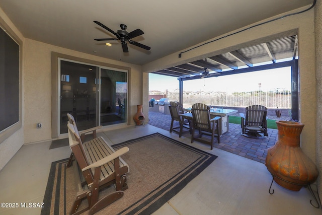 view of patio / terrace featuring ceiling fan, outdoor dining area, fence, and a grill