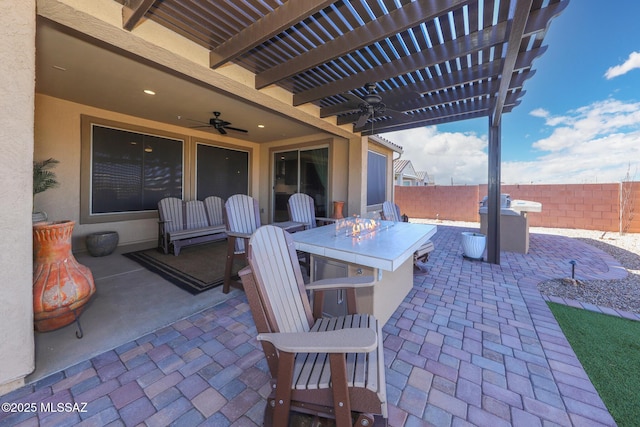 view of patio / terrace featuring ceiling fan, outdoor dining area, fence, and a pergola