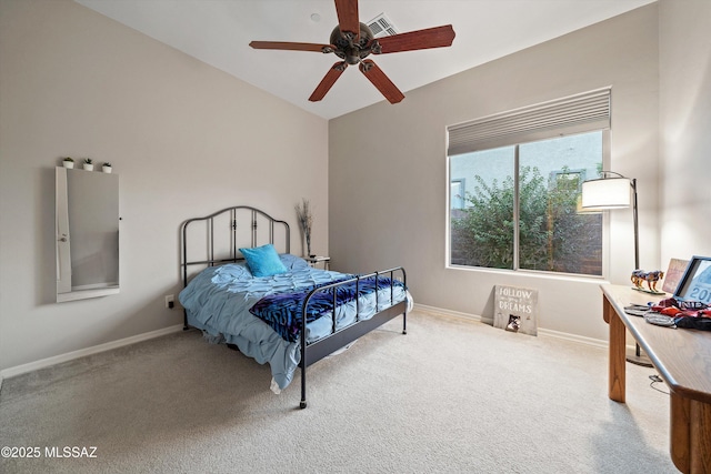 carpeted bedroom featuring ceiling fan and lofted ceiling