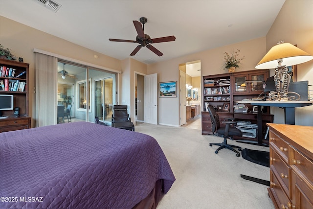 carpeted bedroom with ensuite bath