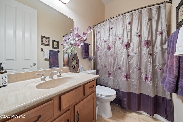 bathroom featuring vanity, tile patterned floors, toilet, and a shower with shower curtain