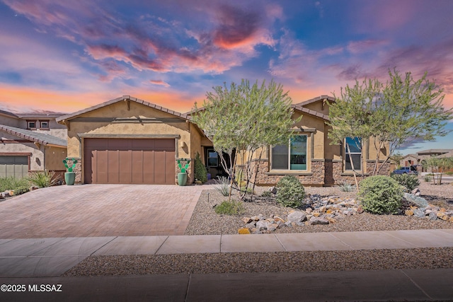 view of front of home featuring a garage