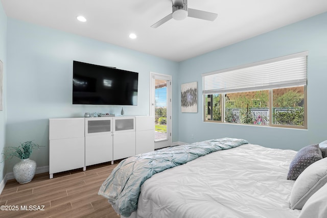 bedroom featuring ceiling fan and light wood-type flooring