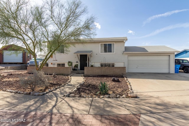 raised ranch featuring a garage