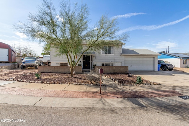 view of front of property featuring a garage